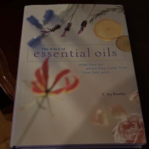 E. Joy Bowles Essential Oils Book - Blue and Yellow Cover